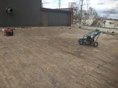Old roof has been removed down to the roof deck